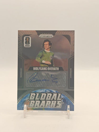 2026 PANINI PRIZM FIFA WORLD CUP WOLFGANG OVERATH GERMANIA GLOBAL GRAPHS AUTO