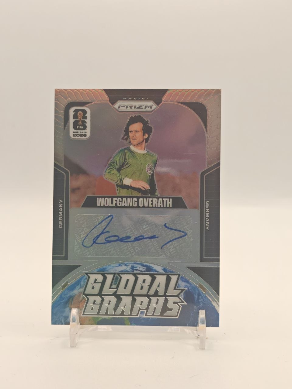 2026 PANINI PRIZM FIFA WORLD CUP WOLFGANG OVERATH GERMANIA GLOBAL GRAPHS AUTO 046/199